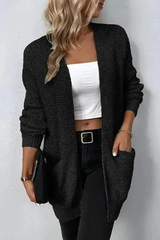 Różowy sweter z otwartym przodem